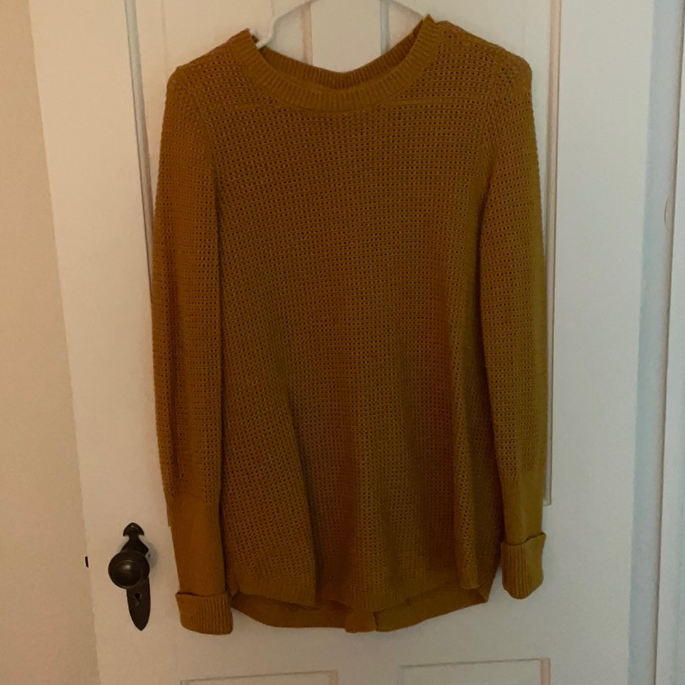 Mustard color sweater. Size large.